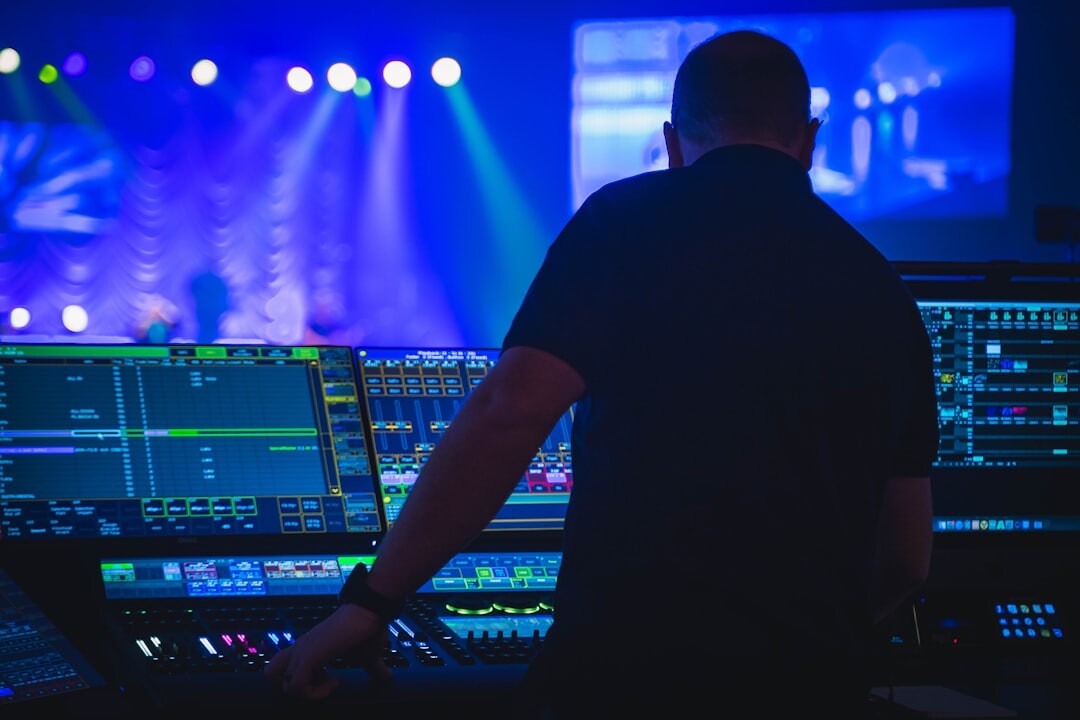 Finnish male sound engineer portrait at an audio console