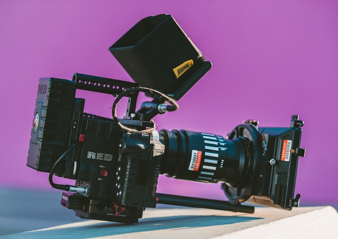 Close-up of a professional broadcast camera lens and viewfinder